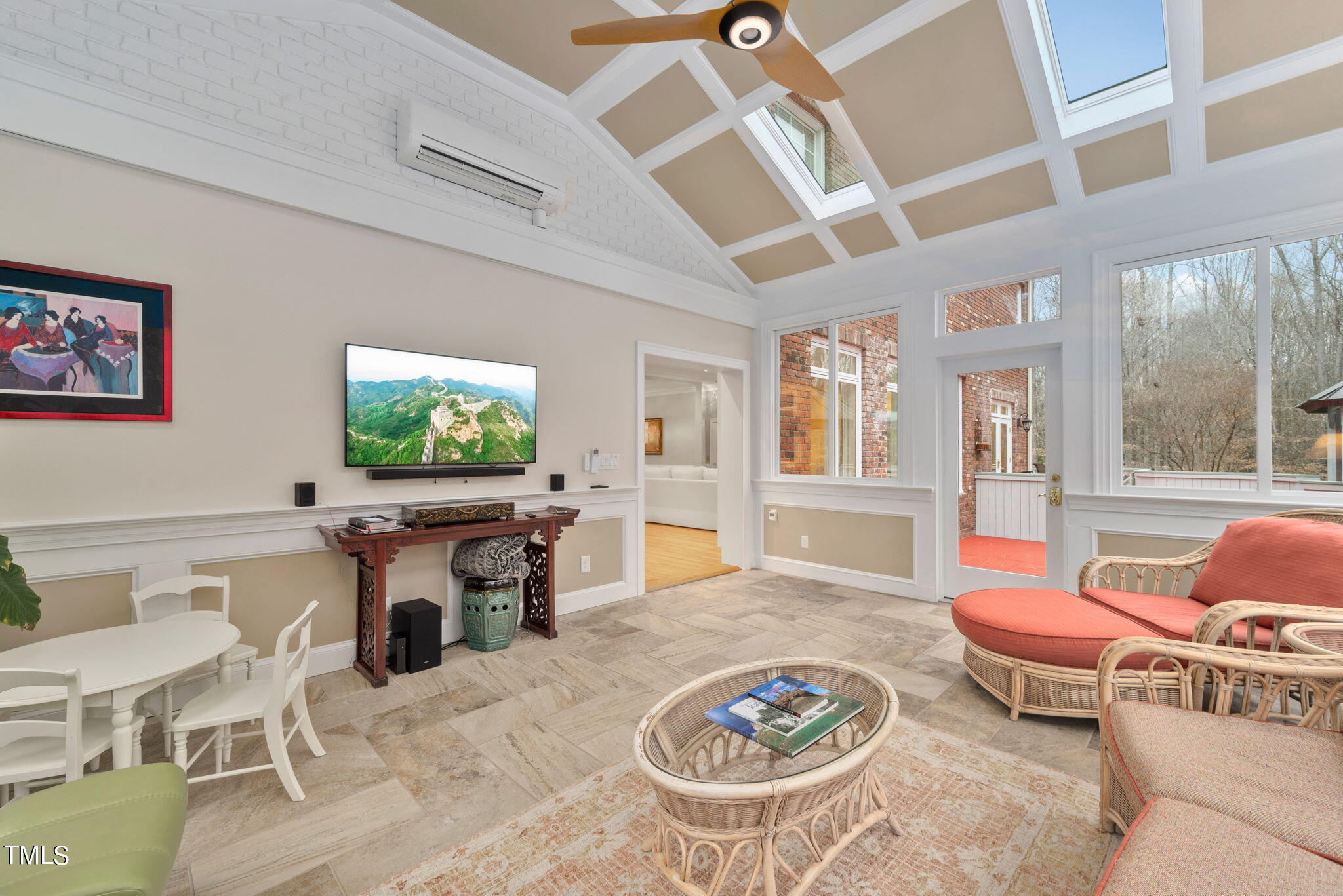 1625 Morning Mountain Road Raleigh, NC 27614 - Photo 11 of 50 a living room with furniture a rug and a flat screen tv