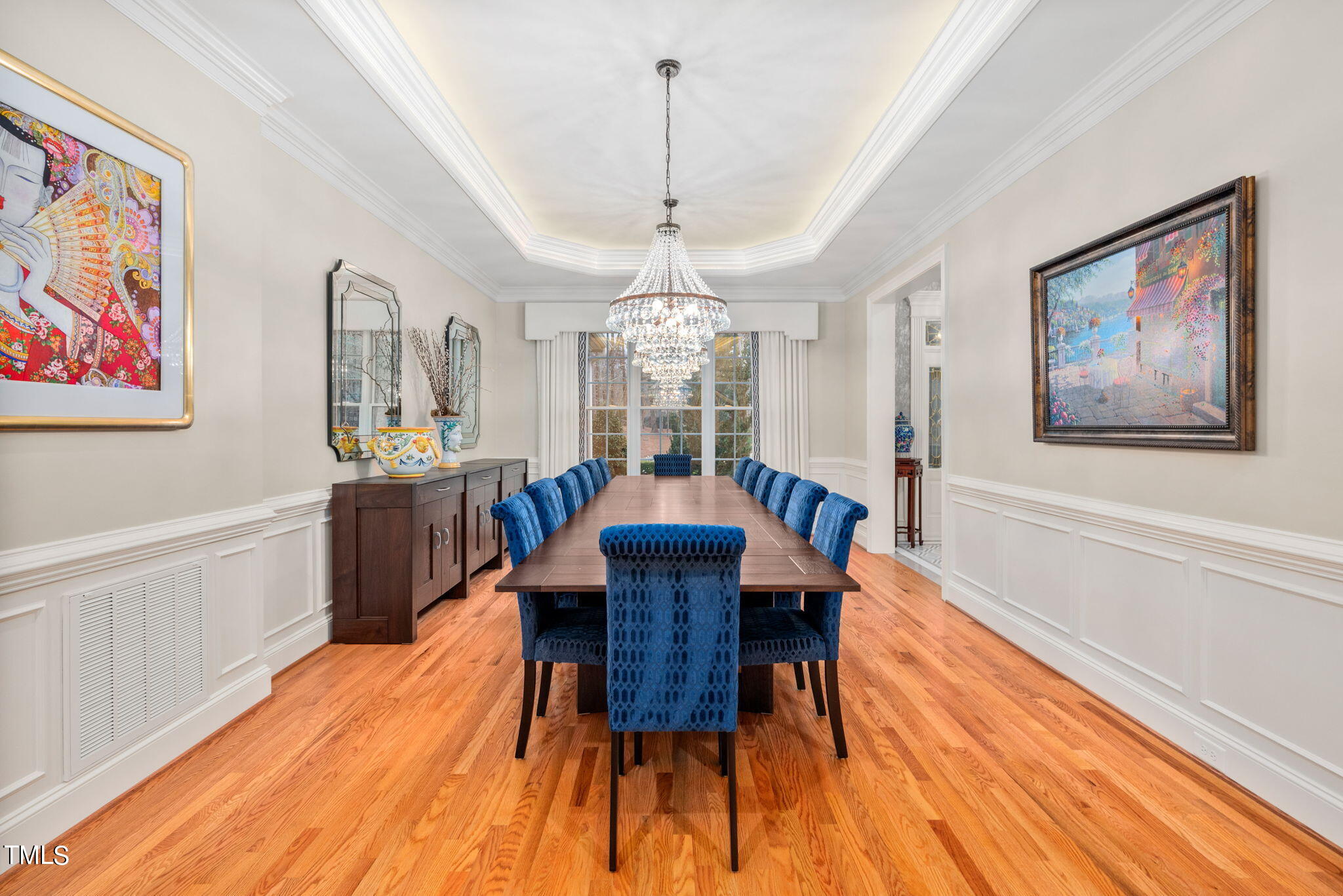 1625 Morning Mountain Road Raleigh, NC 27614 - Photo 15 of 50 a view of a dining room with furniture window and wooden floor