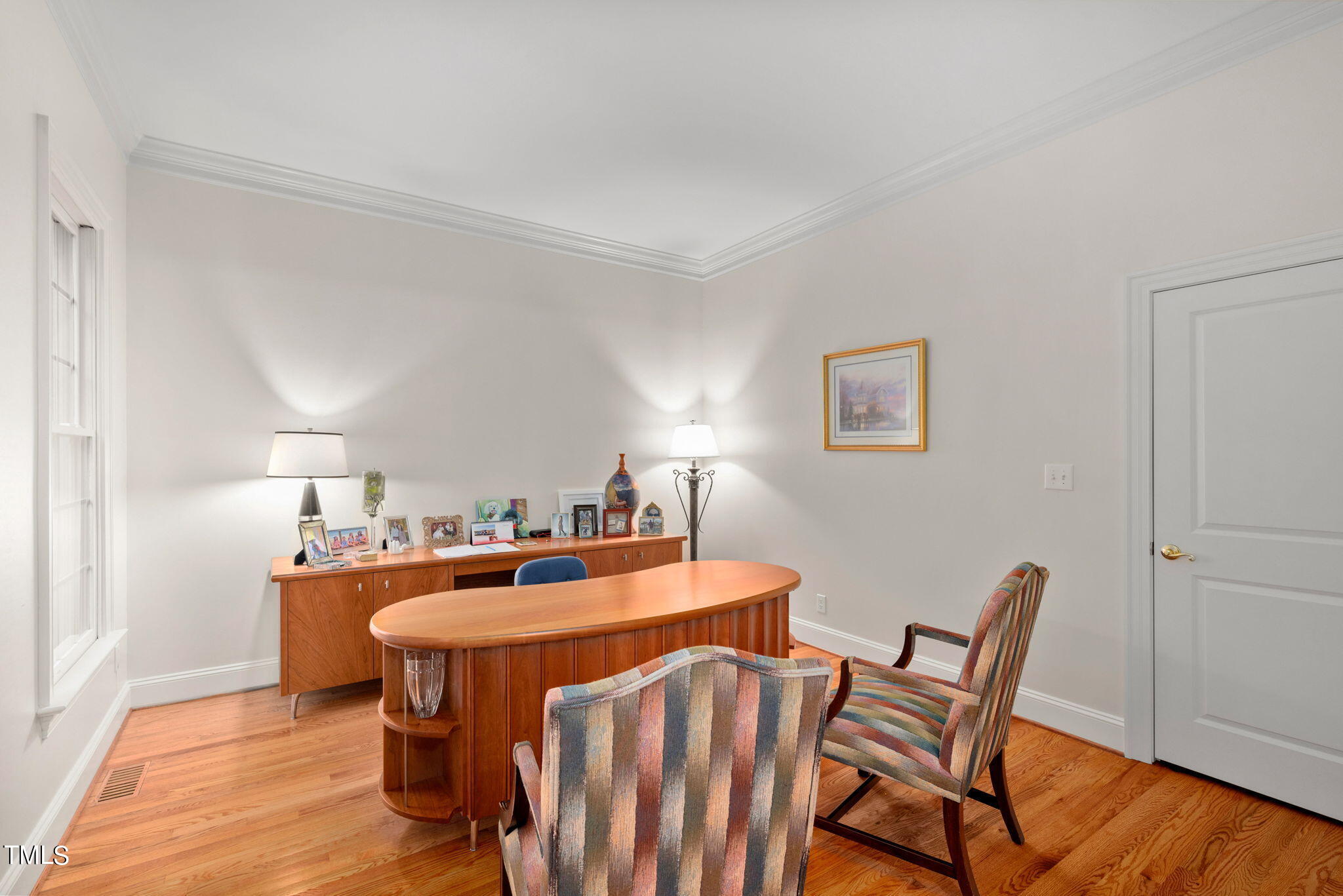 1625 Morning Mountain Road Raleigh, NC 27614 - Photo 18 of 50 a table and chairs in a room