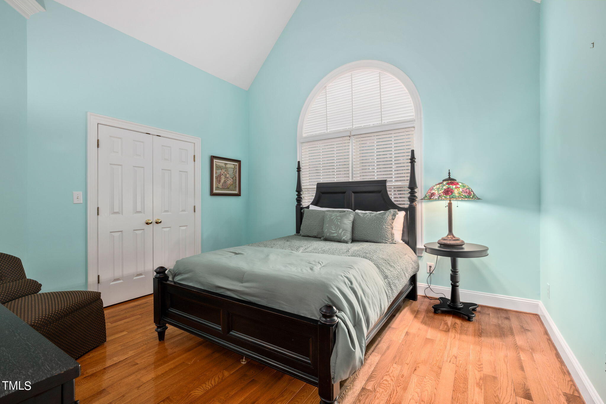 1625 Morning Mountain Road Raleigh, NC 27614 - Photo 19 of 50 a bedroom with a bed and a potted plant