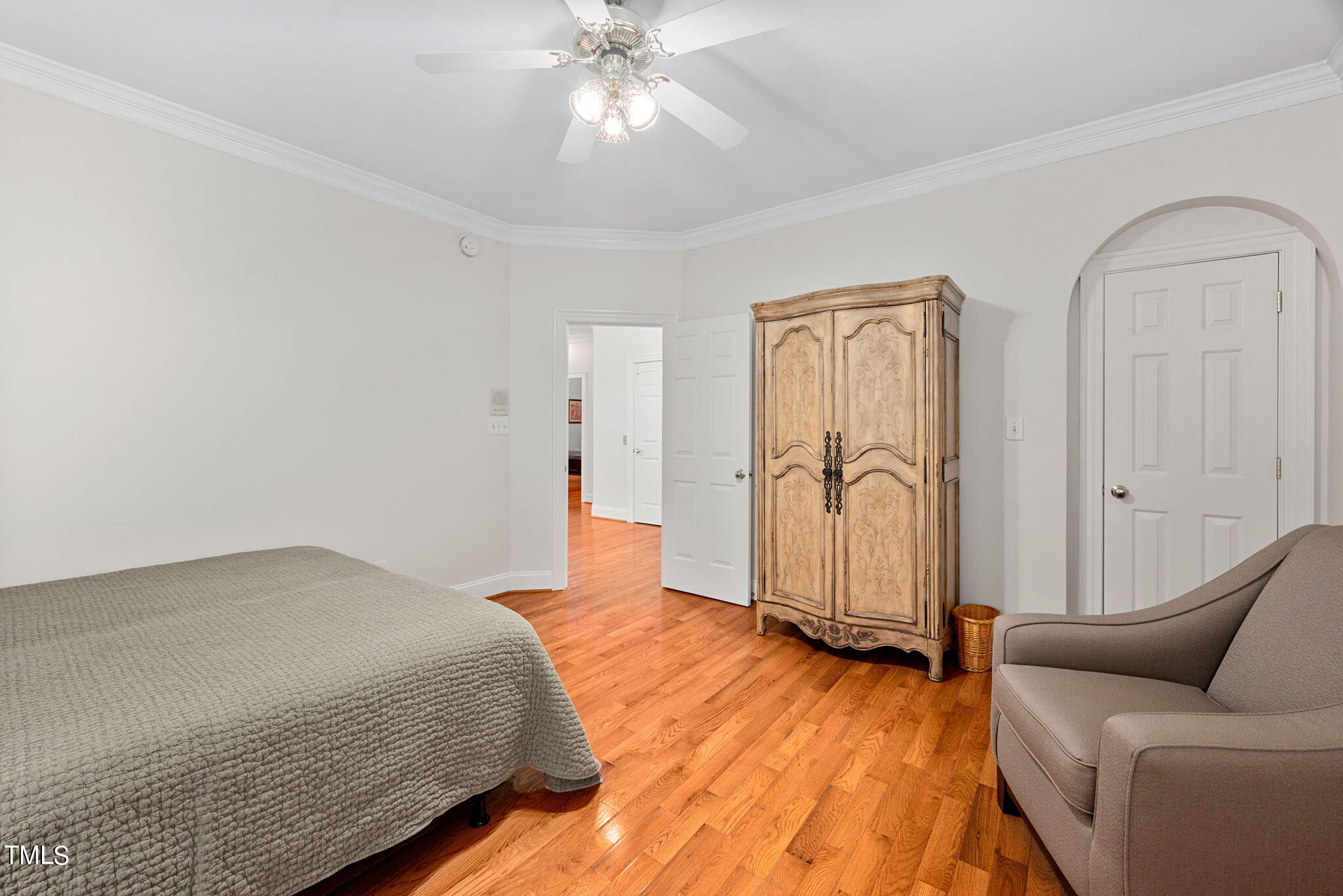 1625 Morning Mountain Road Raleigh, NC 27614 - Photo 22 of 50 a bedroom with a bed and wooden floor