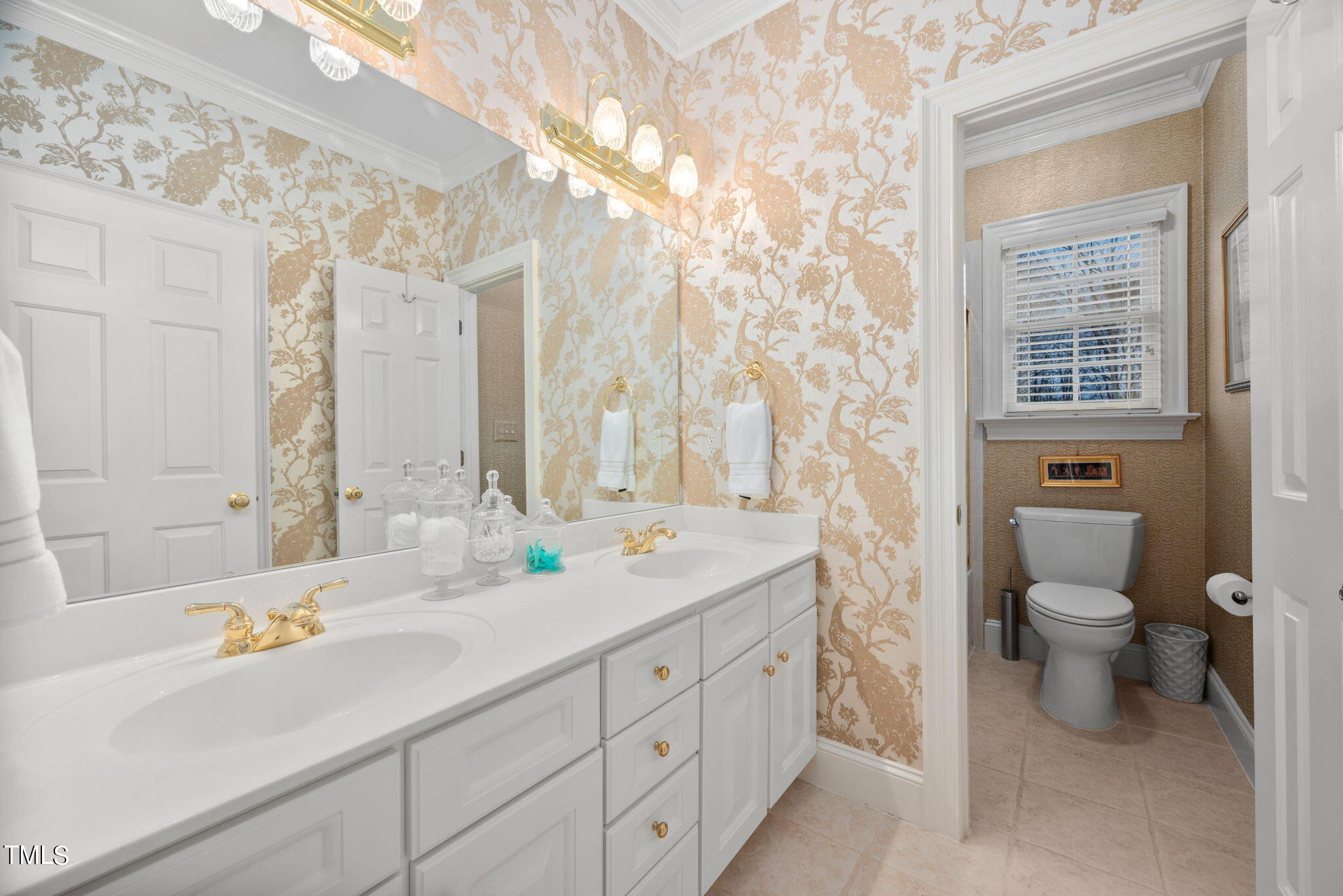 1625 Morning Mountain Road Raleigh, NC 27614 - Photo 23 of 50 a bathroom with a sink double vanity and a toilet