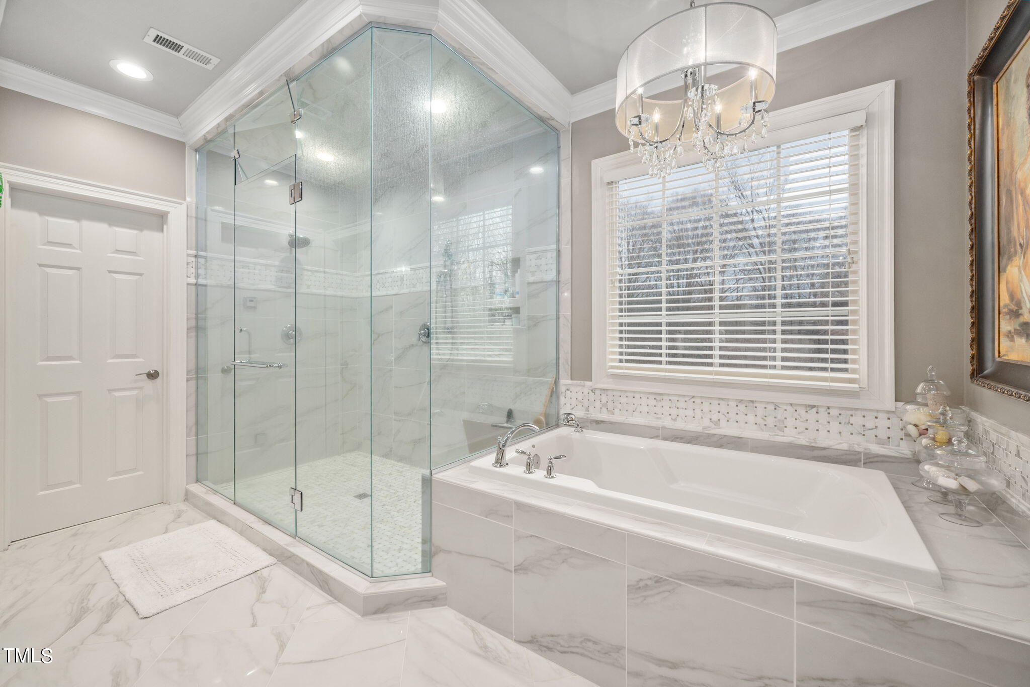 1625 Morning Mountain Road Raleigh, NC 27614 - Photo 26 of 50 a spacious bathroom with a tub shower and window