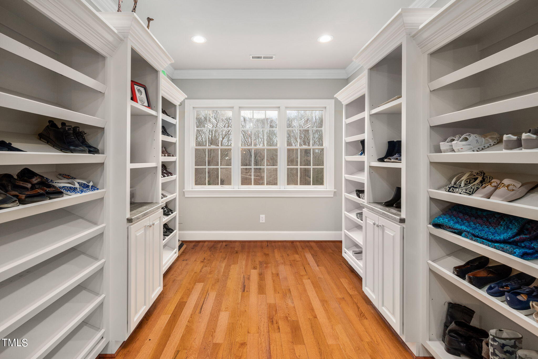 1625 Morning Mountain Road Raleigh, NC 27614 - Photo 33 of 50 a view of walk in closet with clothes and shoes