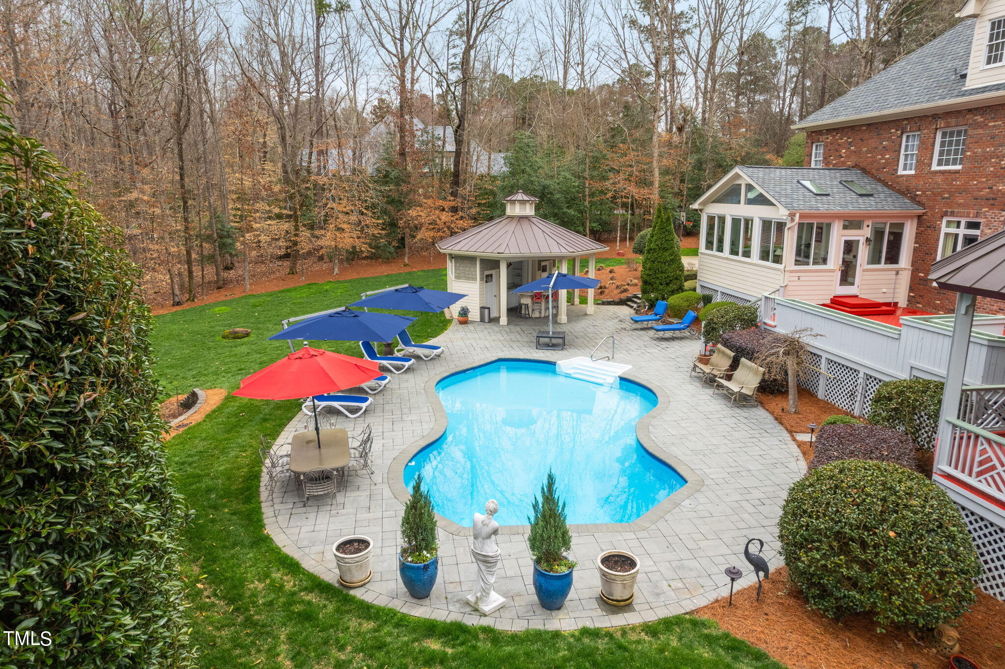 1625 Morning Mountain Road Raleigh, NC 27614 - Photo 40 of 50 a view of a swimming pool with sitting area