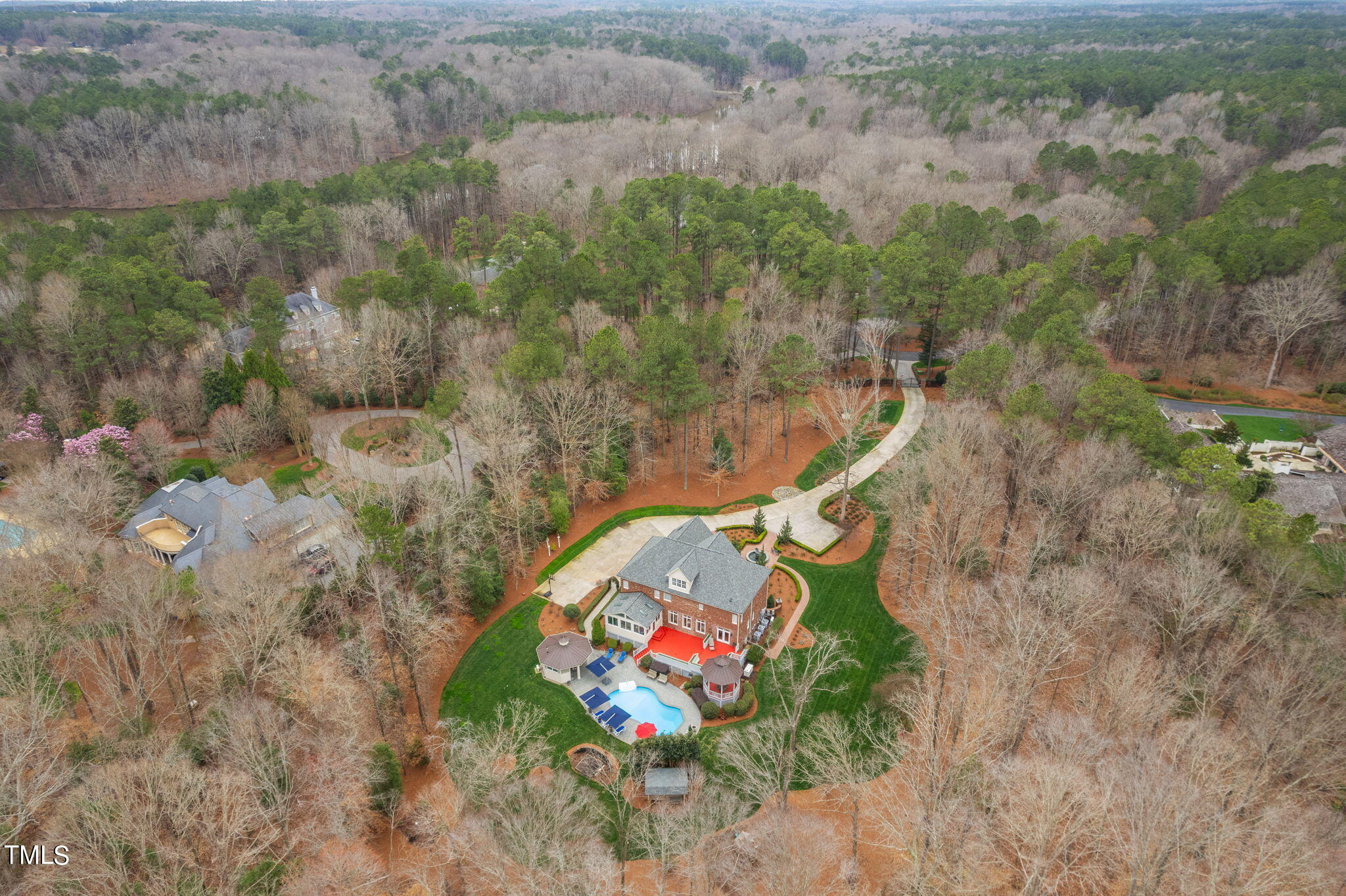 1625 Morning Mountain Road Raleigh, NC 27614 - Photo 41 of 50 a aerial view of a house with a yard and large trees