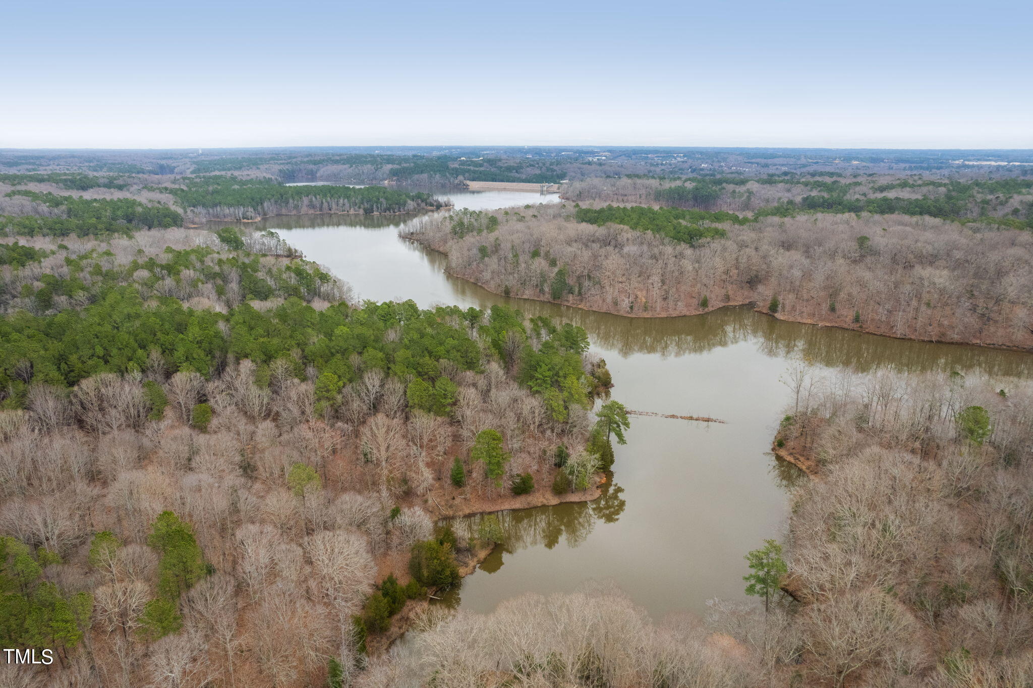 1625 Morning Mountain Road Raleigh, NC 27614 - Photo 42 of 50 a view of a lake with mountains in the background
