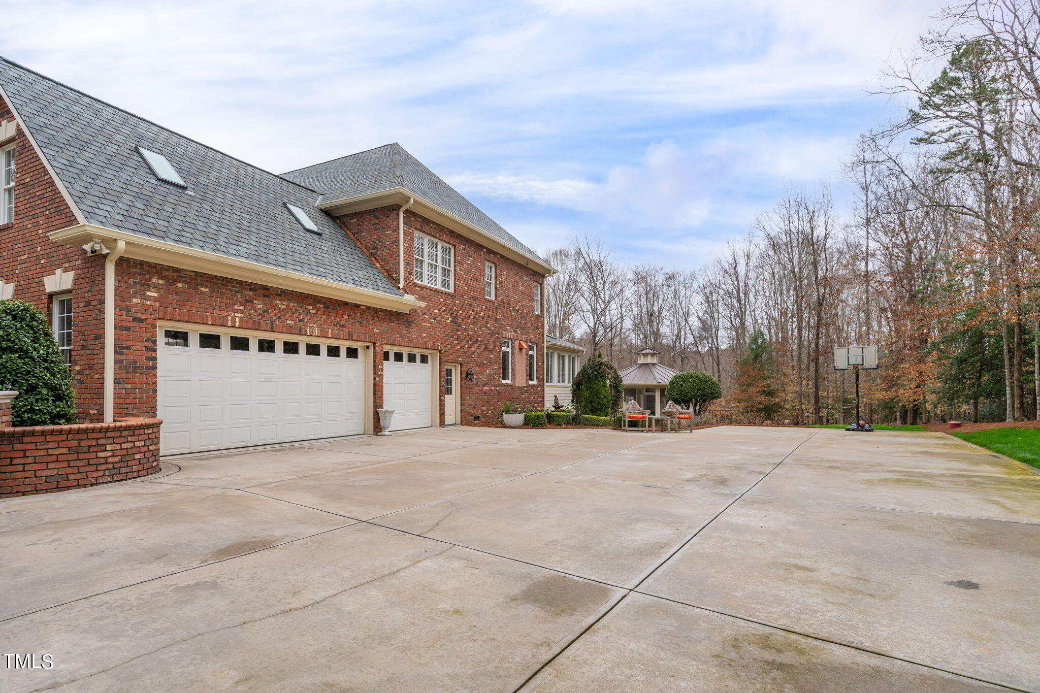 1625 Morning Mountain Road Raleigh, NC 27614 - Photo 44 of 50 a view of a house with a yard and garage