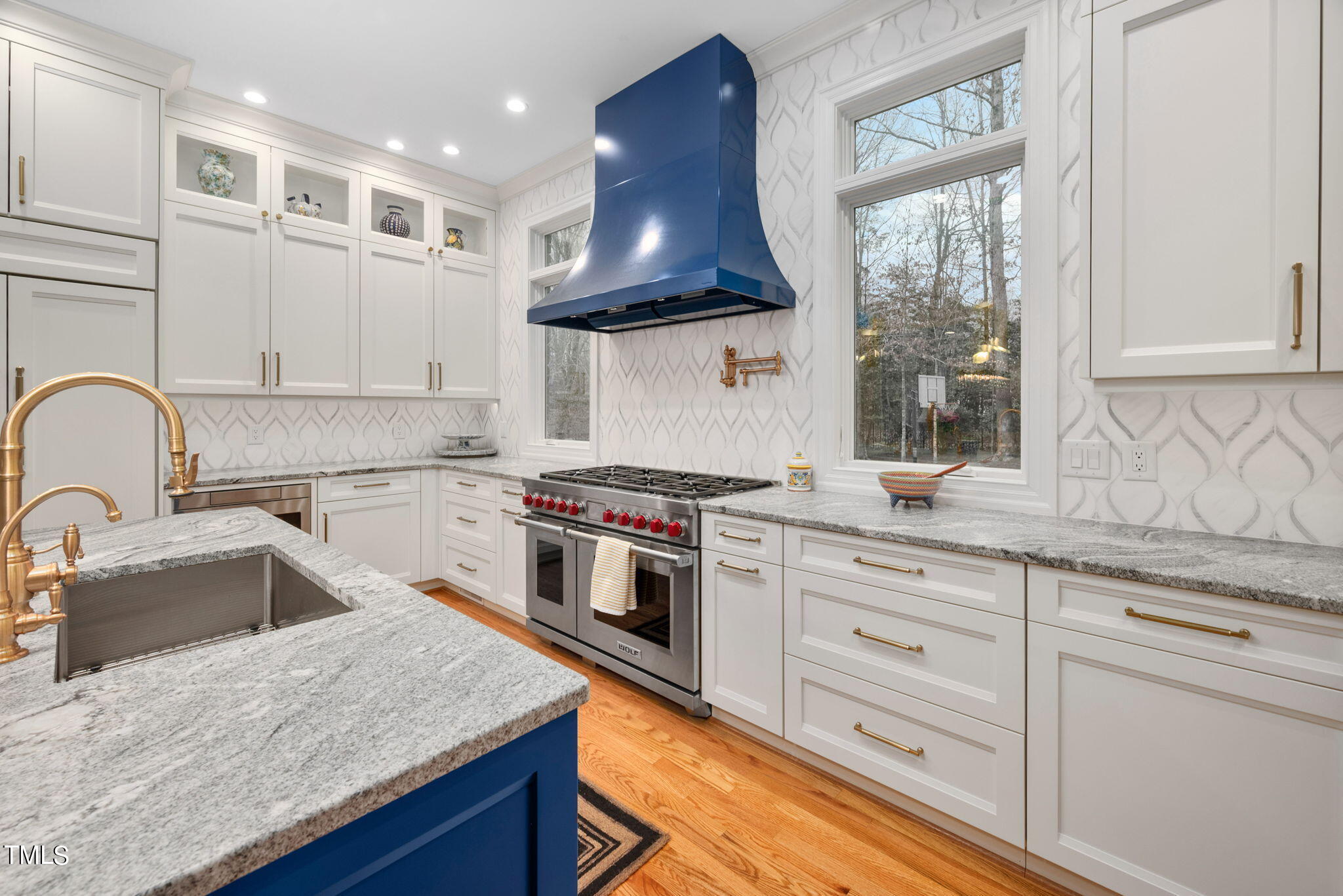 1625 Morning Mountain Road Raleigh, NC 27614 - Photo 10 of 50 a kitchen with stainless steel appliances granite countertop a sink stove and refrigerator