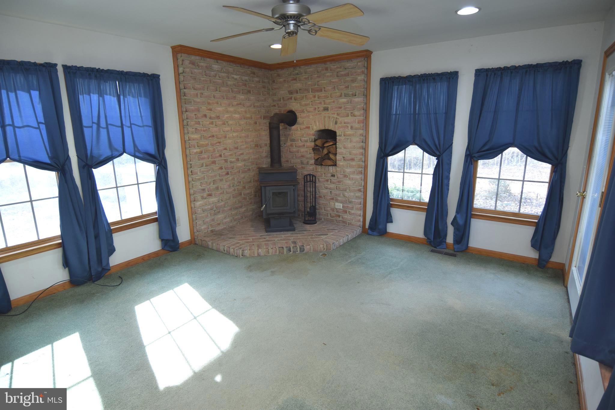3136 McDowell Road Bridgeville, DE 19933 - Photo 11 of 32 a view of livingroom with hardwood floor and window