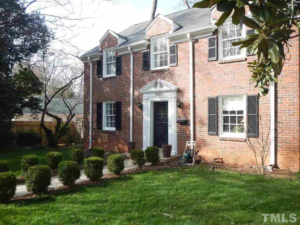 2602 Clark Avenue Raleigh, NC 27607 - Photo 4 of 7 front view of a house with a yard