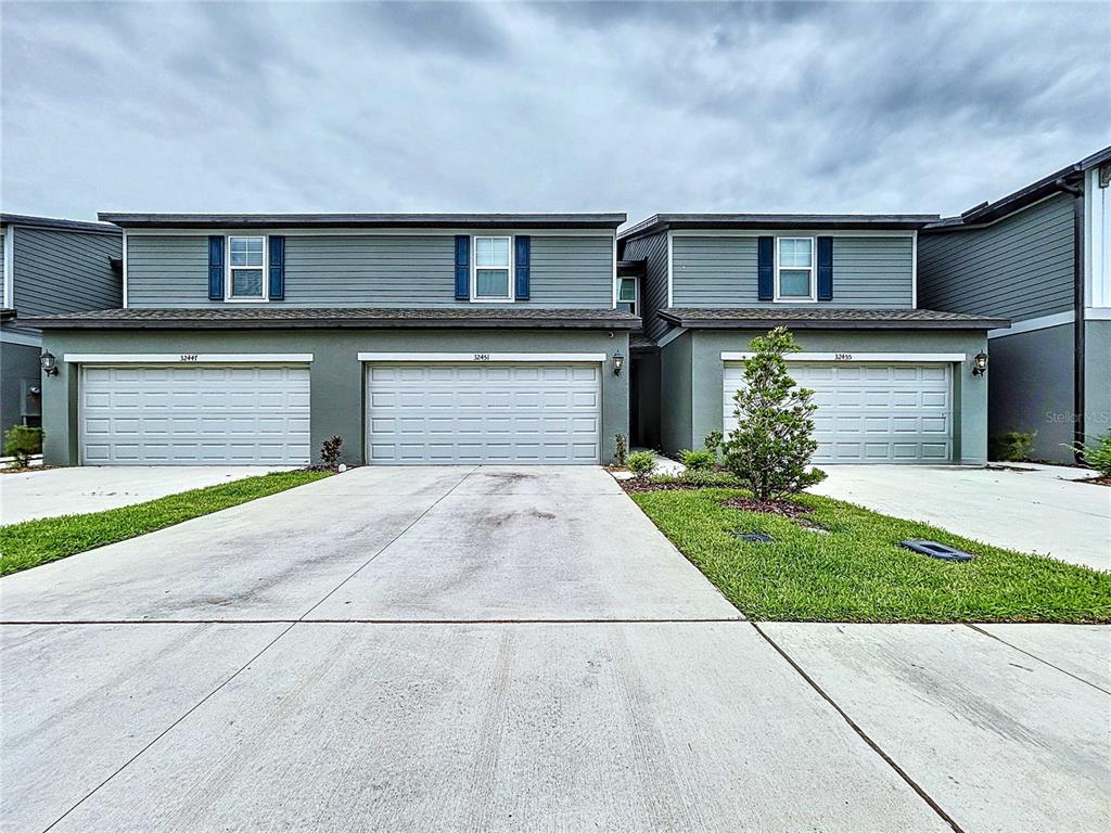 32451 Limitless Place Wesley Chapel, FL 33545 - Photo 3 of 58