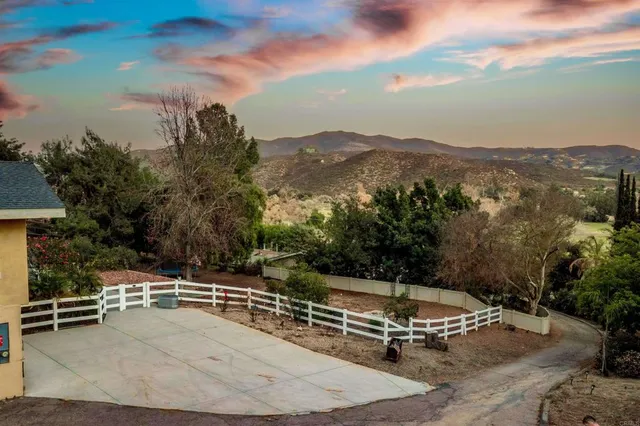 a view of a city with mountains in the background
