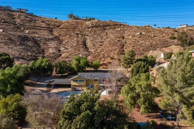 a view of a terrace with sitting area