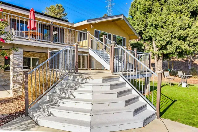a living room with a couch and a flat screen tv