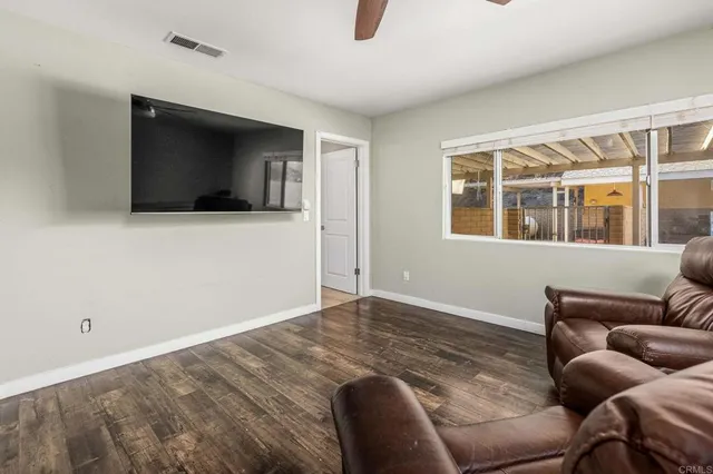 a view of a livingroom with a workspace