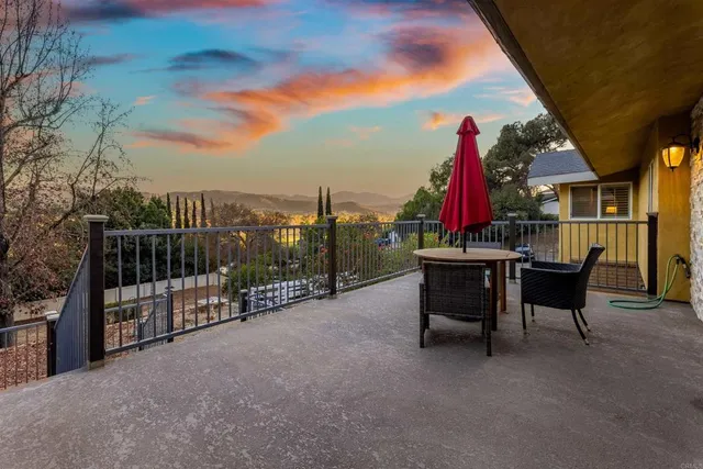 a aerial view of a house with a yard