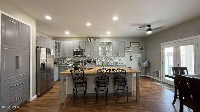 a view of a dining area with furniture window and wooden floor