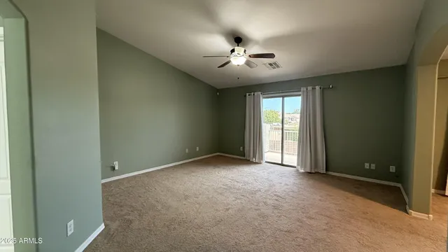 an empty room with a bathroom