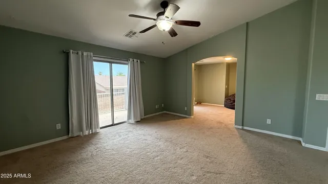 a view of a workspace with furniture