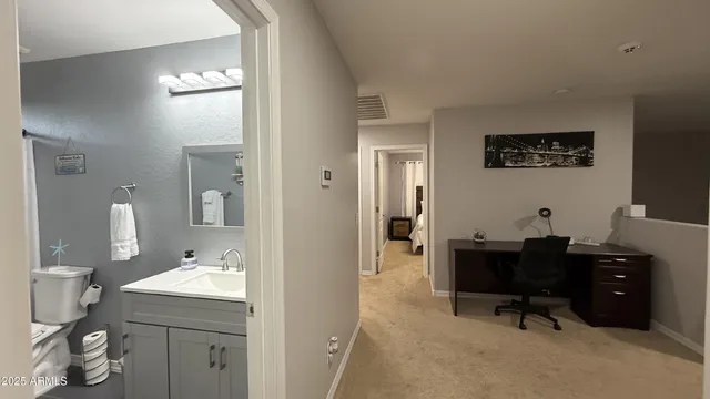 a bathroom with a bathtub and a sink