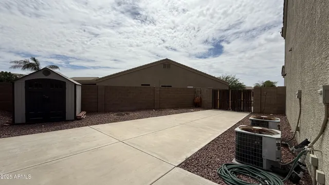 a view of a swimming pool with a yard