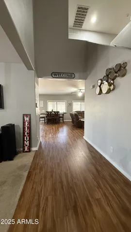 a hallway with a wooden floor