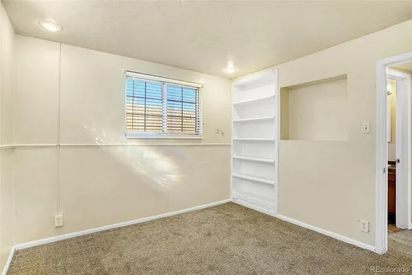 an empty room with a window