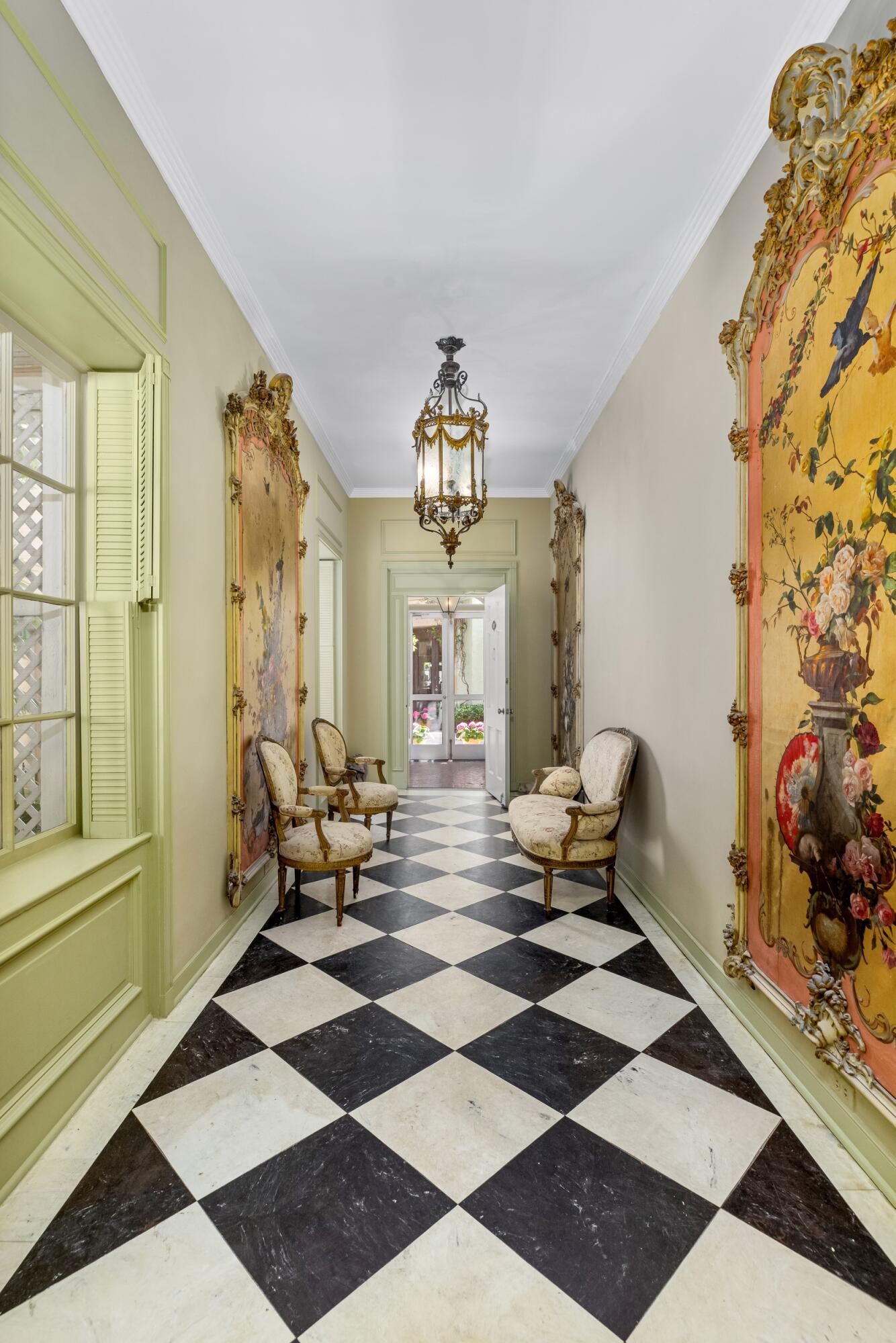 9 Via Parigi Palm Beach, FL 33480 - Photo 18 of 31 a living room with furniture and a chandelier