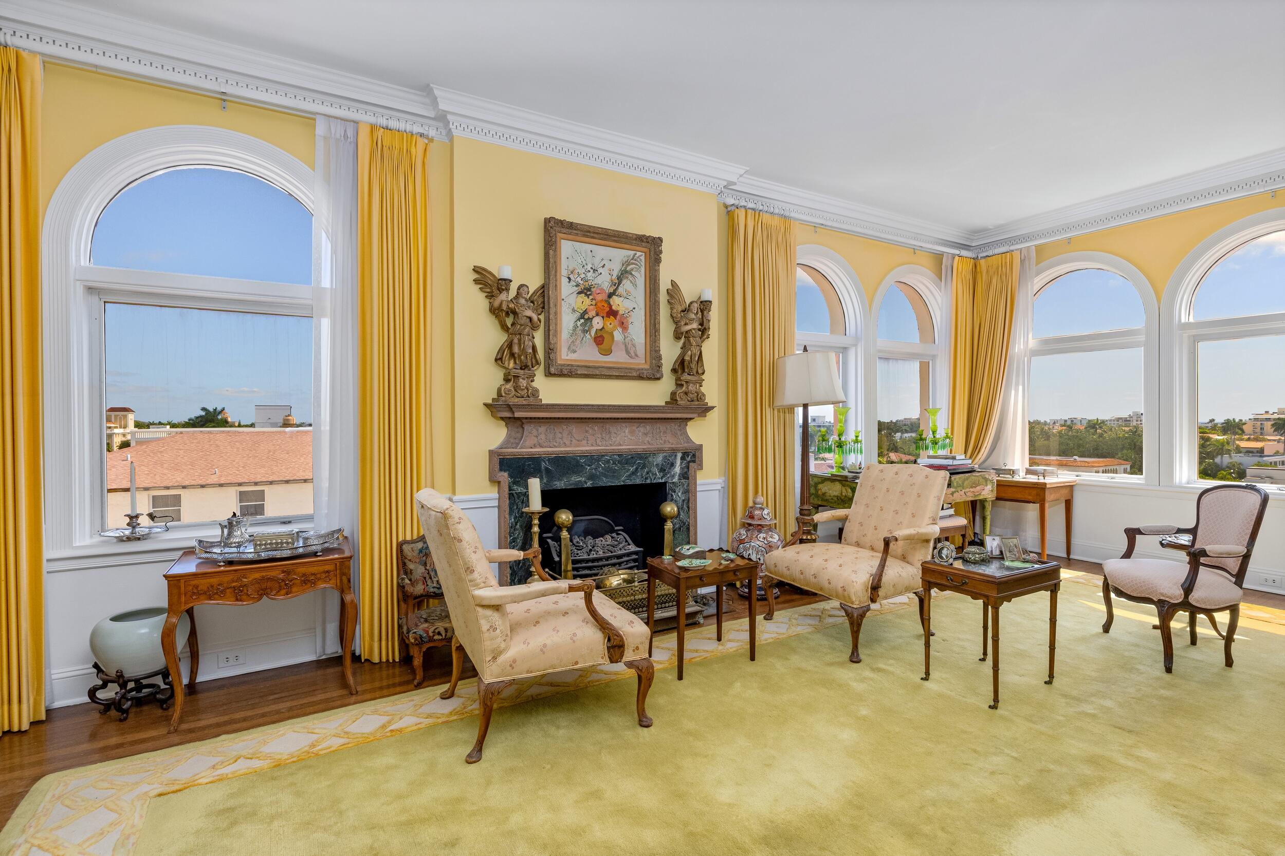 9 Via Parigi Palm Beach, FL 33480 - Photo 21 of 31 a living room with furniture and a fireplace