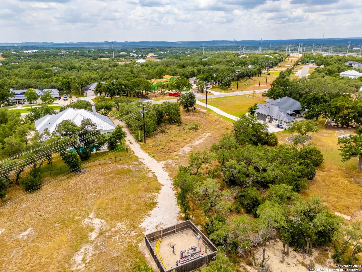 34848 Thanksgiving Trail Bulverde, TX 78163 - Photo 12 of 20 a view of a lake with houses