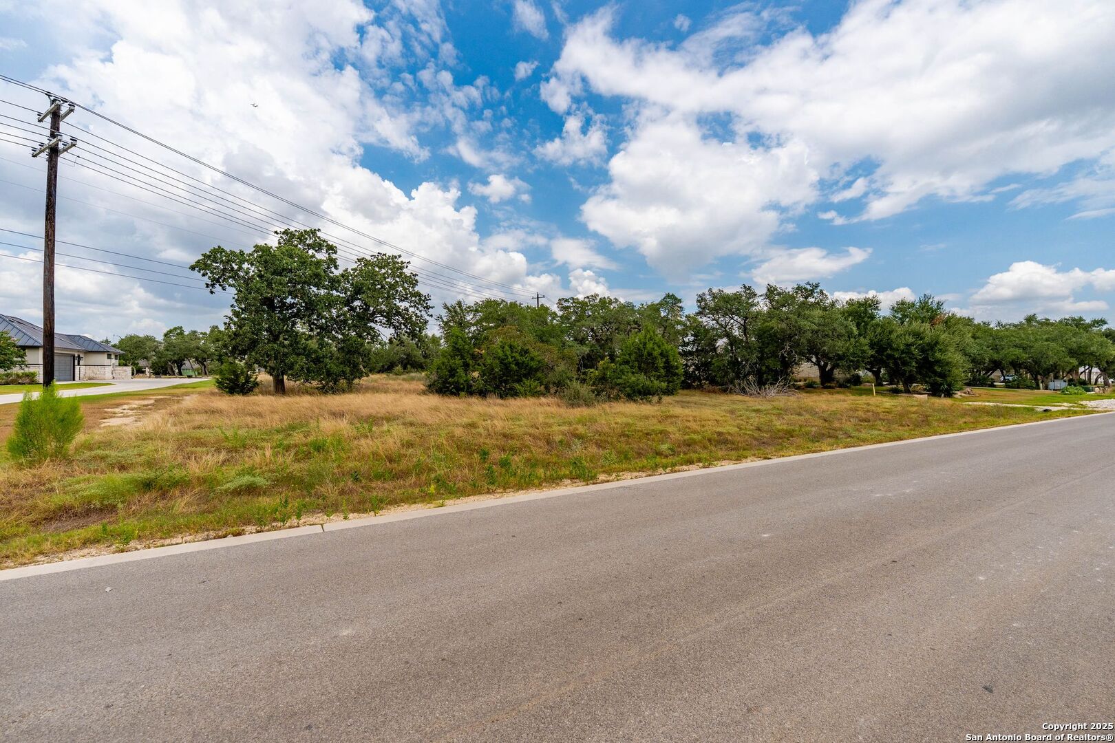 34848 Thanksgiving Trail Bulverde, TX 78163 - Photo 13 of 20 a view of an swimming pool and a yard