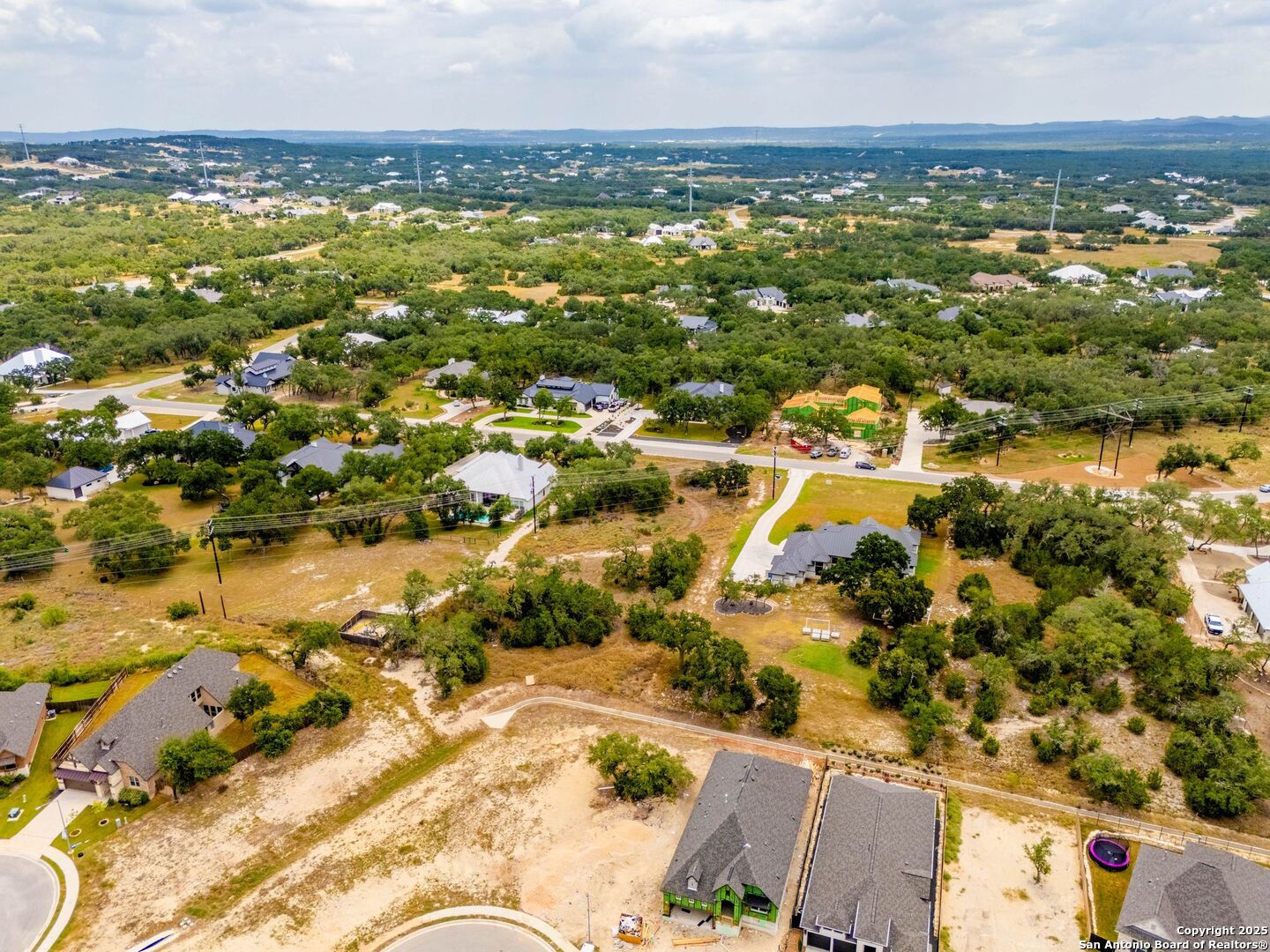 34848 Thanksgiving Trail Bulverde, TX 78163 - Photo 17 of 20 an aerial view of residential houses with outdoor space