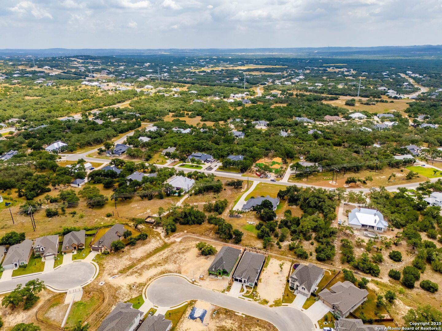 34848 Thanksgiving Trail Bulverde, TX 78163 - Photo 2 of 20 an aerial view of residential building with parking space