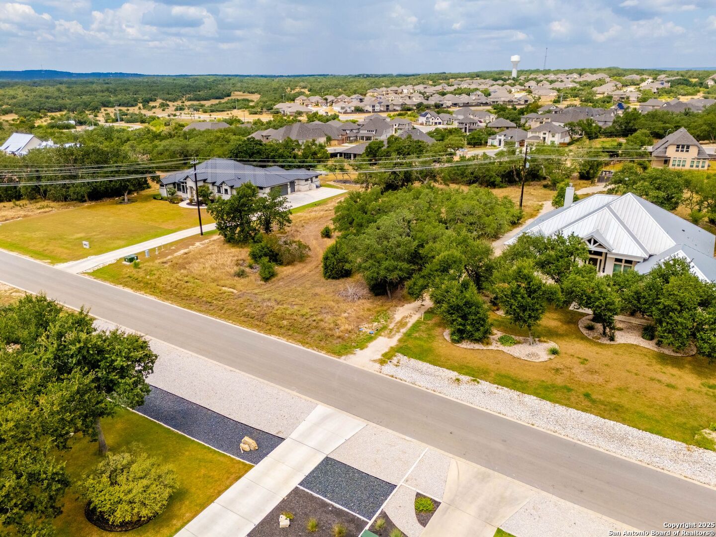 34848 Thanksgiving Trail Bulverde, TX 78163 - Photo 8 of 20 an aerial view of residential houses with outdoor space