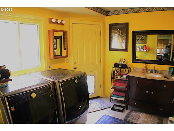 a bathroom with a shower and a mirror