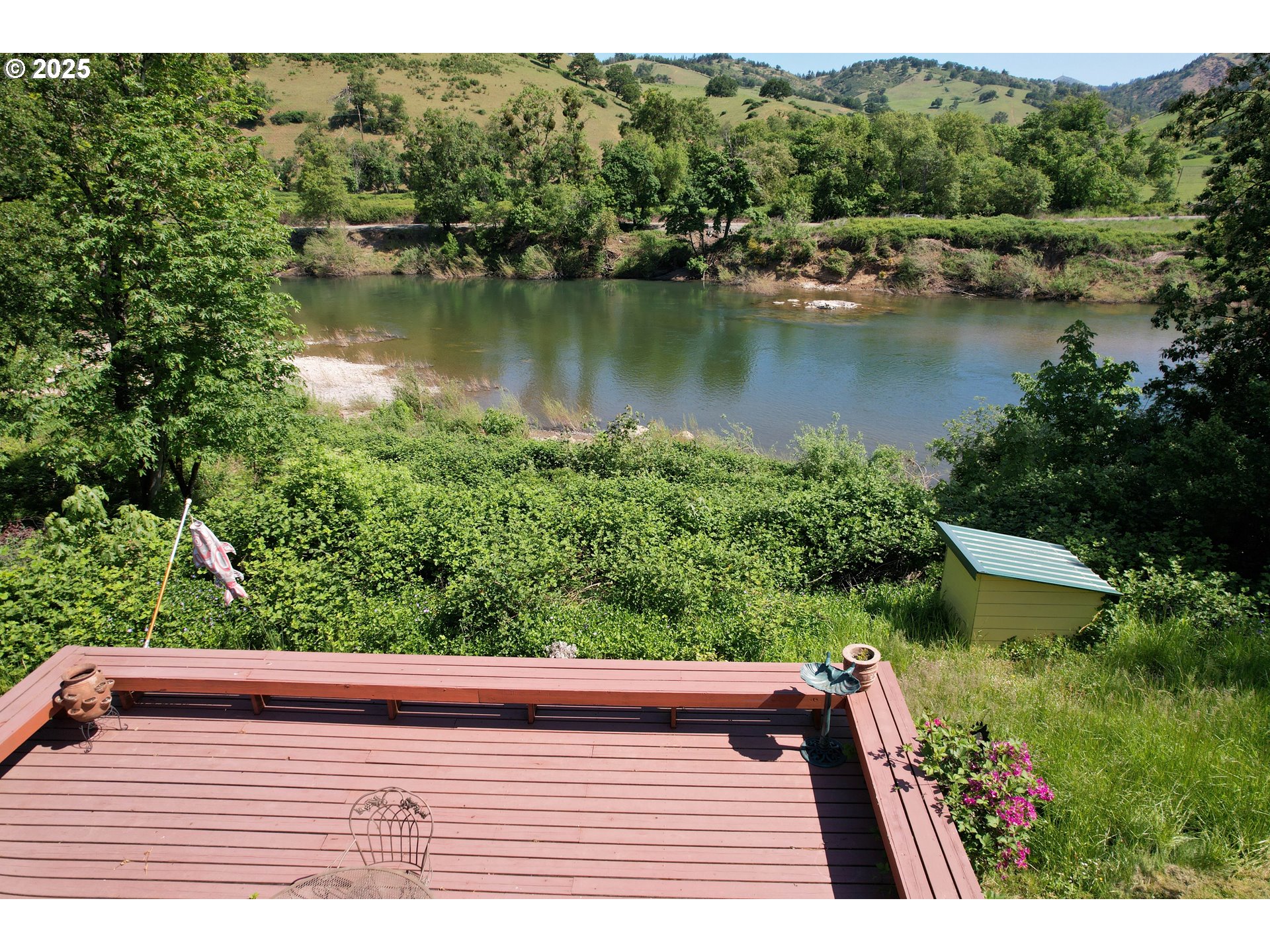 180 Ruckles Drive Myrtle Creek, OR 97457 - Photo 36 of 45 a view of a yard with a lake view