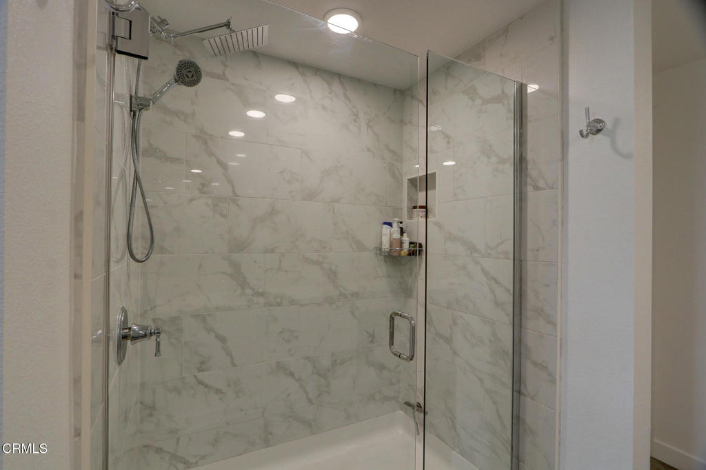 2810 Wagon Wheel Road, Unit 304 Oxnard, CA 93036 - Photo 17 of 36 a bathroom with a shower