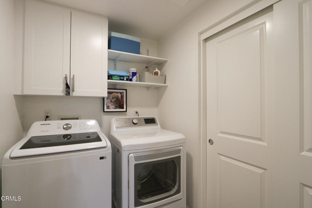 2810 Wagon Wheel Road, Unit 304 Oxnard, CA 93036 - Photo 25 of 36 a utility room with dryer and washer