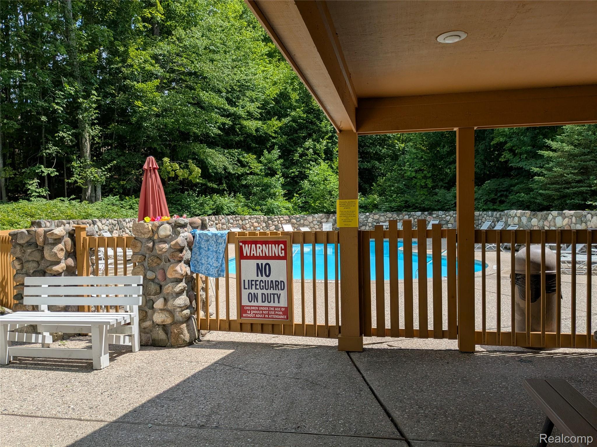 4749 South Pleasantview Road, Unit 37 Harbor Springs, MI 49740 - Photo 34 of 44 Outdoor Pool Near North Entrance
