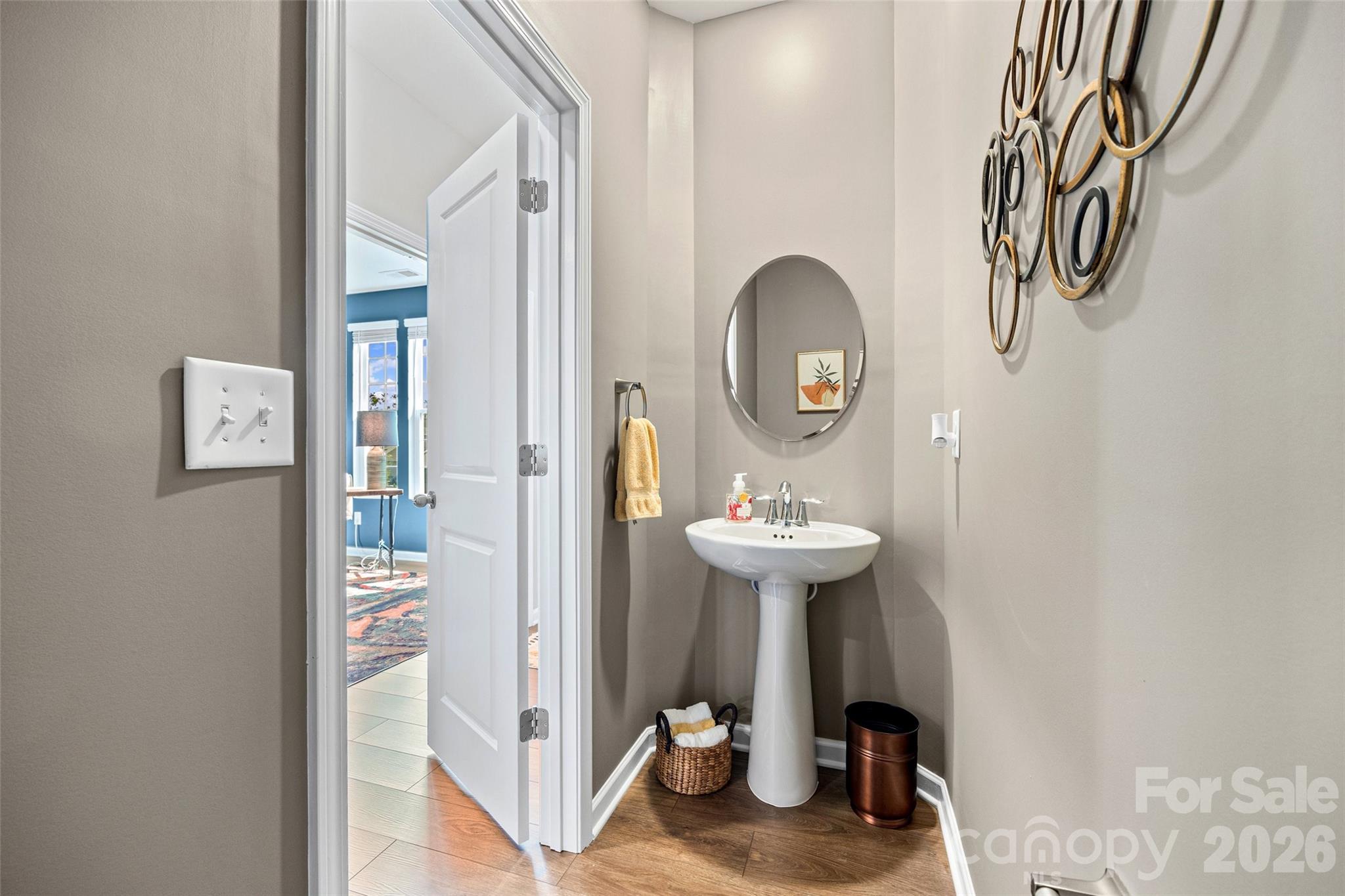 909 Cobbled Way Fort Mill, SC 29715 - Photo 11 of 31 a bathroom with a sink and a mirror