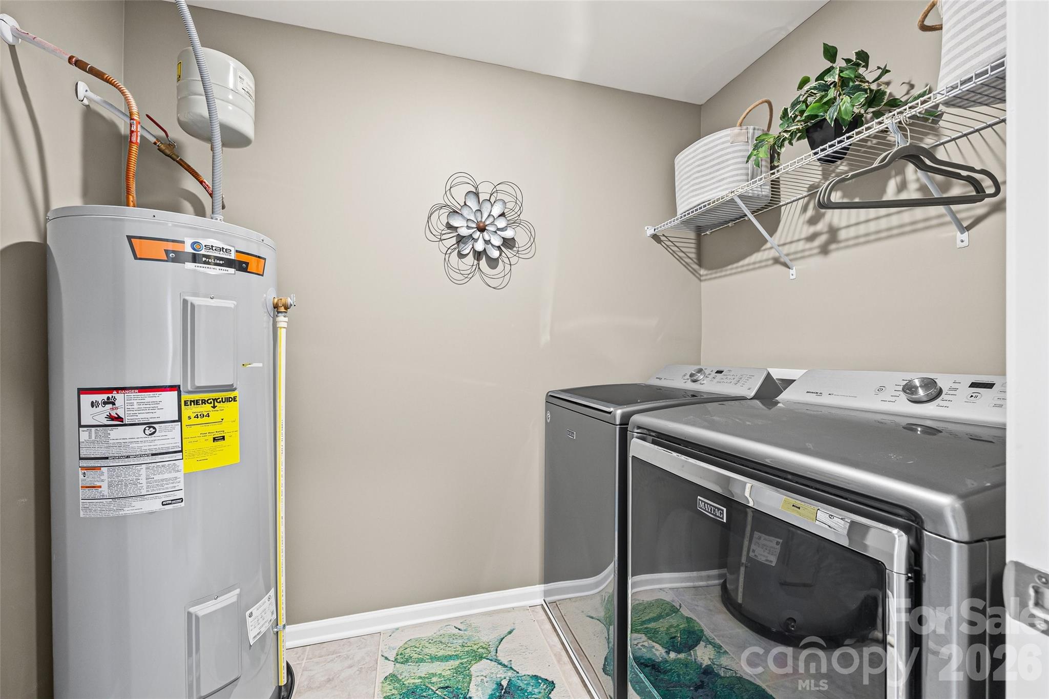 909 Cobbled Way Fort Mill, SC 29715 - Photo 18 of 31 a utility room with dryer and washer