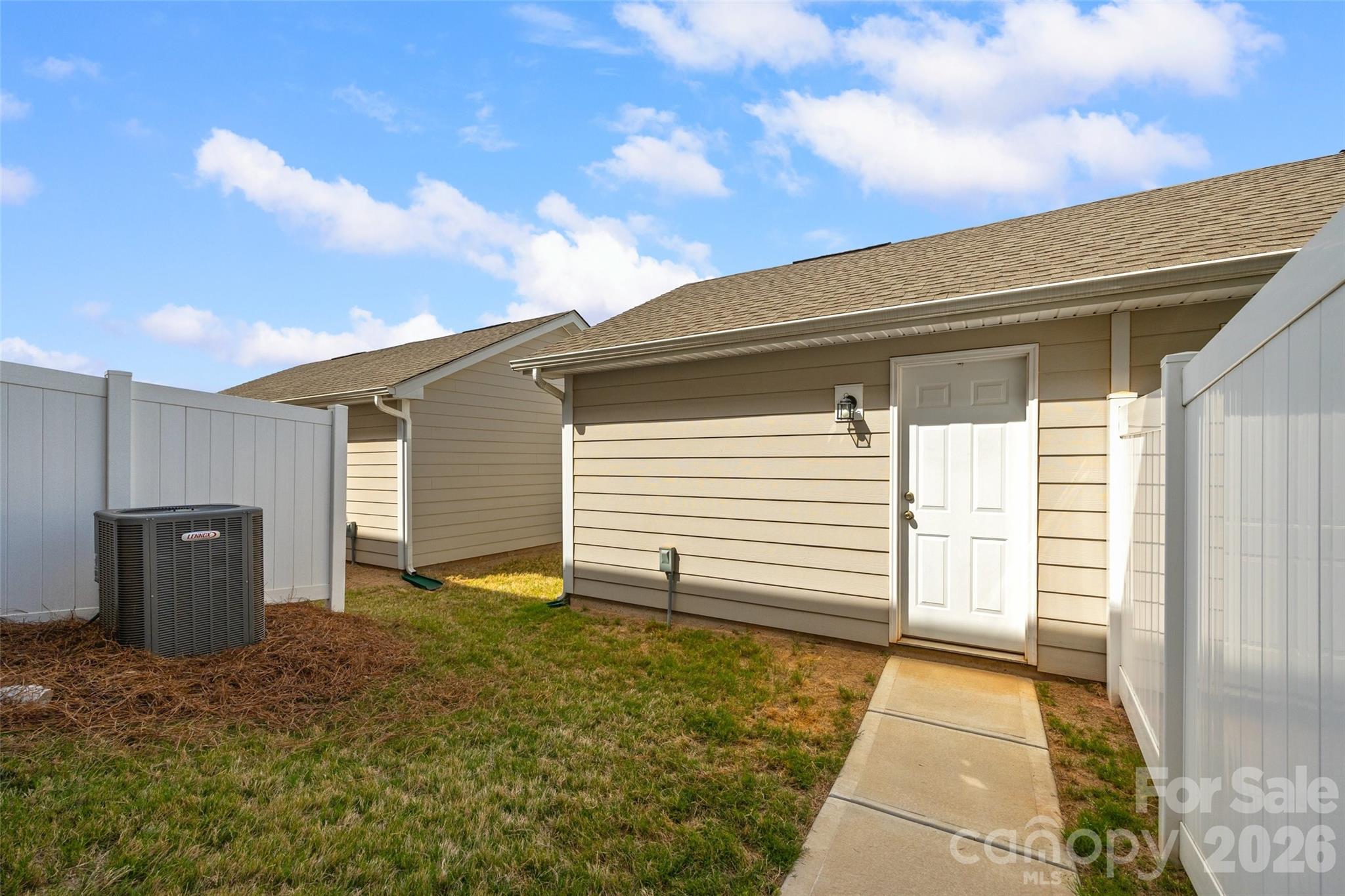 909 Cobbled Way Fort Mill, SC 29715 - Photo 23 of 31 a backyard of house with wooden stairs and a large tree