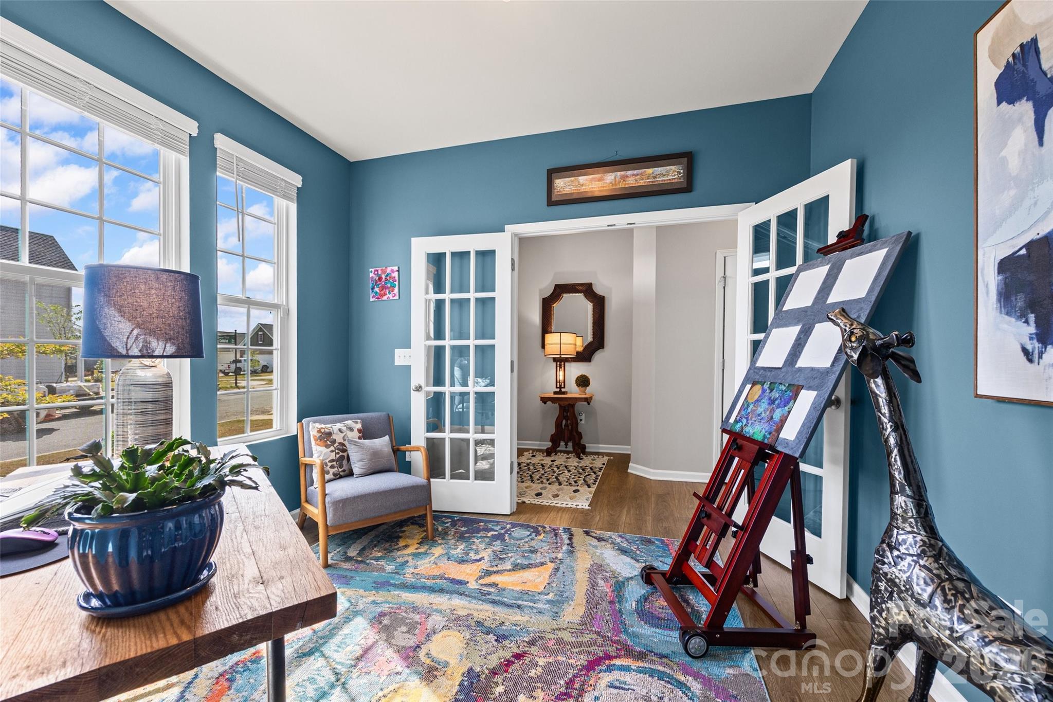 909 Cobbled Way Fort Mill, SC 29715 - Photo 4 of 31 a living room with furniture and a potted plant