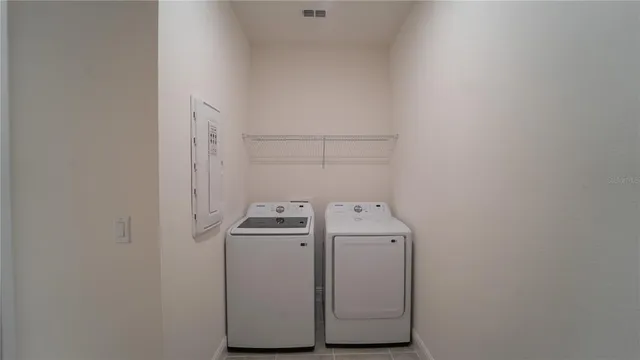 a view of a room that has a glass door