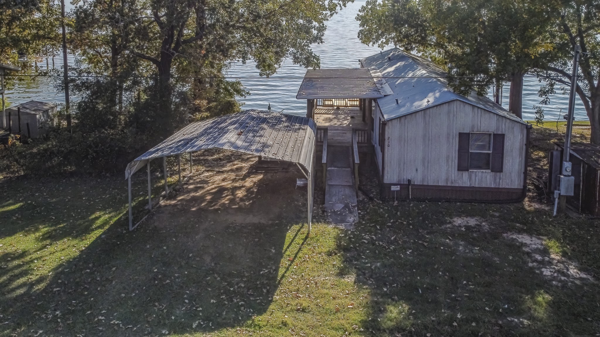 210 Rain Forest Road Onalaska, TX 77360 - Photo 6 of 26 a building view with a outdoor space