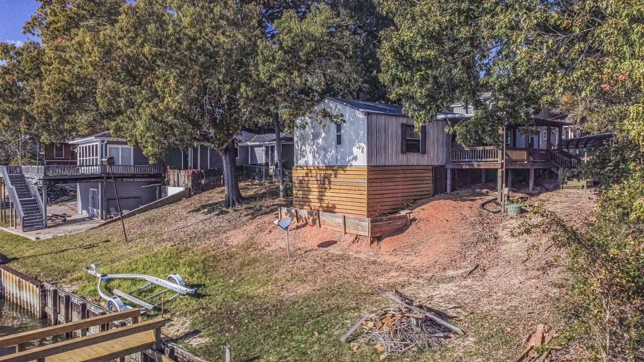 210 Rain Forest Road Onalaska, TX 77360 - Photo 7 of 26 a view of a house with backyard and sitting area