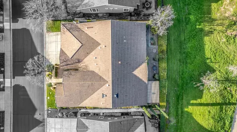 a dining room with furniture window and wooden floor