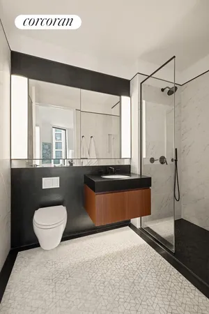 a room with a bed and a view of bathroom