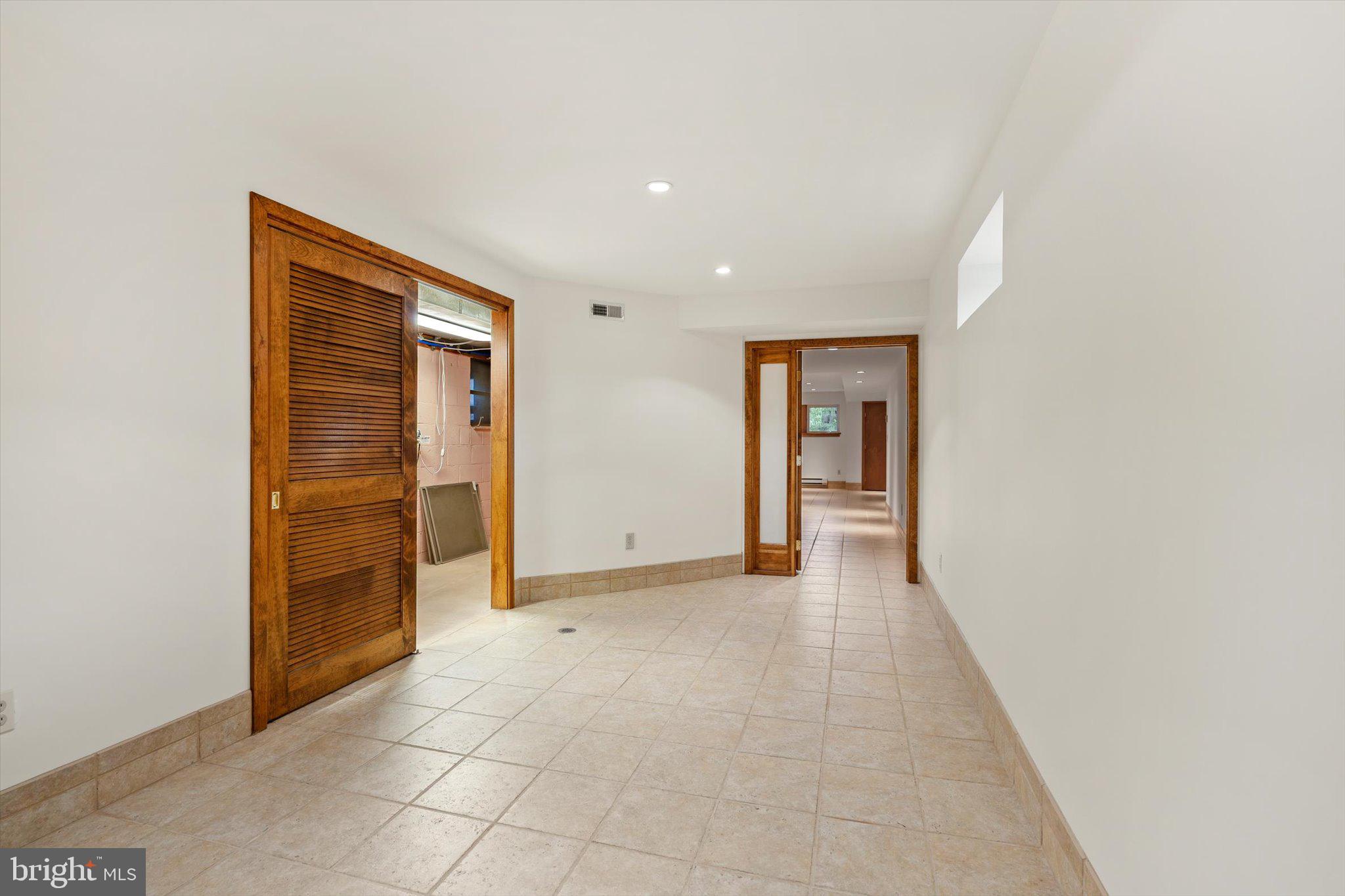 6783 Chapel Road New Hope, PA 18938 - Photo 24 of 42 Hall/hobby room opens to large family room.